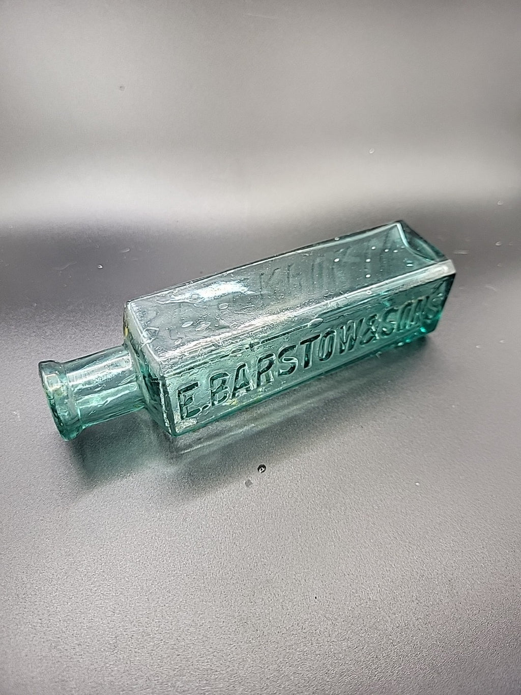 Antique E Barstow & Sons Stockport Chemist Bottle c1880 Embossed Aqua Glass